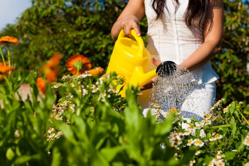 Volunteers and charity partners sorting reusable garden items
